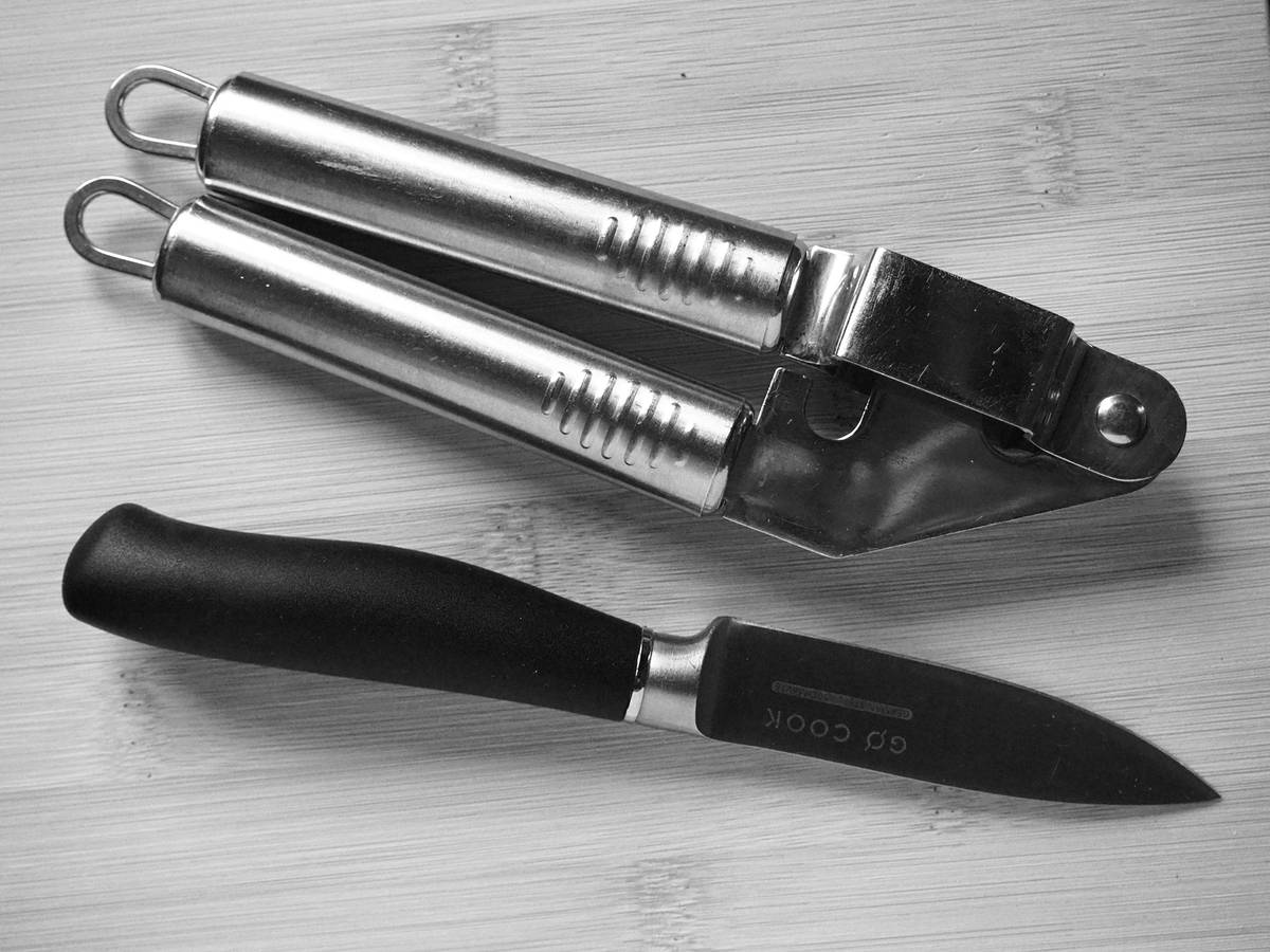 home vegetable tools premium stainless steel chopper with interchangeable blades on wooden countertop